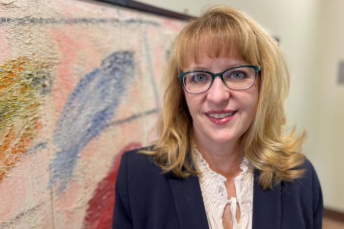 Dr. Julie Battle stands in the Darby School at Brenau University