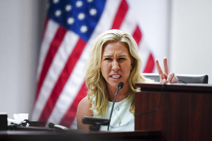 U.S. Rep. Marjorie Taylor Greene speaks during a hearing, Friday, April 22, 2022, in Atlanta. Greene is appearing at a hearing Friday in Atlanta in a challenge filed by voters who say she shouldn't be allowed to seek reelection because she helped facilitate the attack on the Capitol that disrupted certification of Joe Biden's presidential victory.