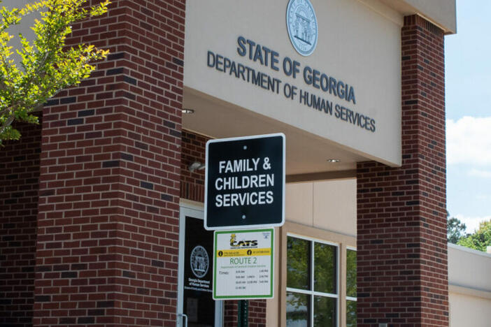A sign shows the entrance to the Department of Family and Children Services in Canton, Ga. on April 22, 2022. 