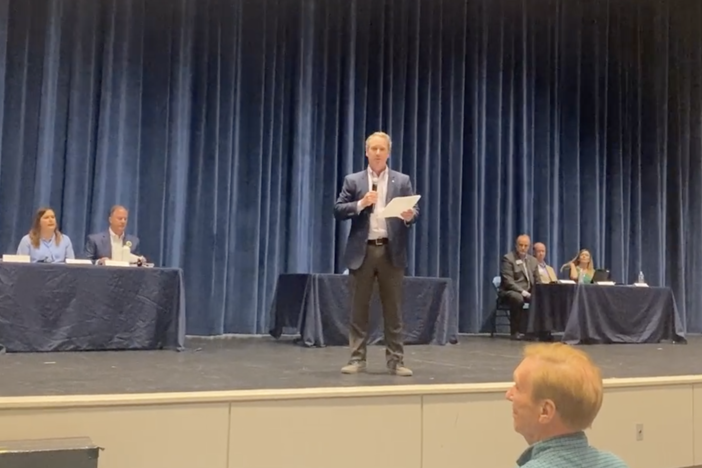 Opponents and proponents of the East Cobb cityhood movement debated May 4, 2022, before a crowd of more than 200 residents at Pope High School.