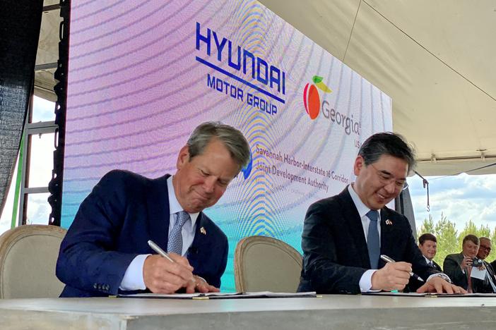 Georgia Governor Brian Kemp and Hyundai Motor Group president and CEO JaeHoon Chang met at a signing ceremony in Bryan County on Friday, May 20, 2022.