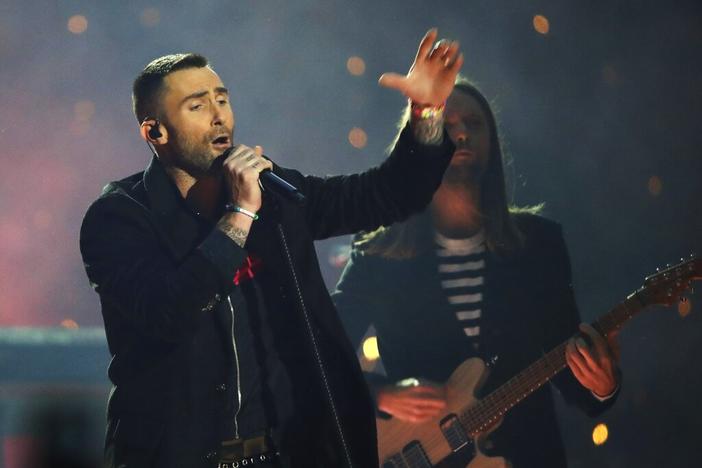 Adam Levine of Maroon 5 performs during halftime of the NFL Super Bowl 53 football game between the Los Angeles Rams and the New England Patriots Sunday, Feb. 3, 2019, in Atlanta. Maroon 5 and Usher will headline a benefit concert in Atlanta to honor the legacy of the late U.S. Rep. John Lewis. The Grammy Award-winning pop band and singer will perform during the Beloved Benefit at the Mercedes-Benz Stadium on July 7, concert officials announced Thursday, May 5, 2022. 