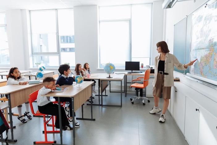 Teacher and children in classroom