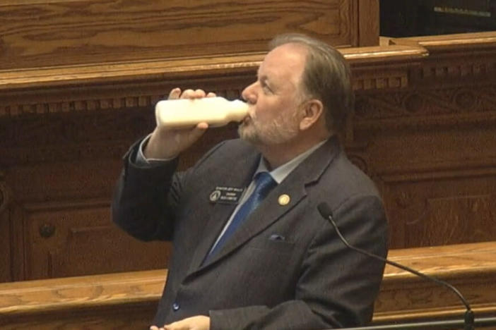 Republican Sen. Jeff Mullis of Chickamauga drinks raw milk, marked for pet consumption, while presenting a bill to legalize it for human consumption during the Senate floor session in this screenshot on April 1, 2022.
