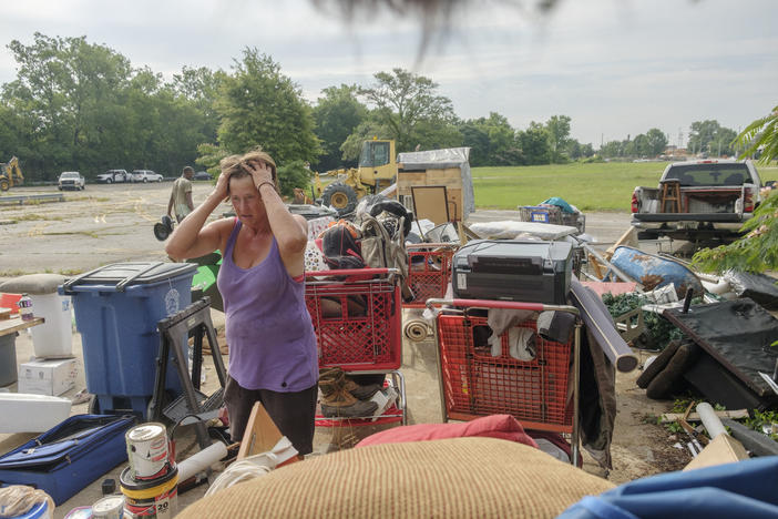 Pat Garrett pauses while packing up her home at the edge of a homeless encampment on Riverside Drive in Macon on June 8, 2022. Macon-Bibb County bulldozed one of the city's largest homeless encampments, saying it was necessary as a public health measure.