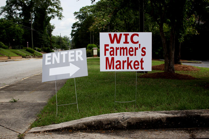 Signage for the WIC Farmers Market in Macon-Bibb County on June 9, 2022. Participants of the suplemental nutrition program have access to the summer markets, hosted by the Georgia Department of Public Health's 18 districts, through September.