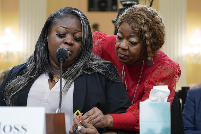 Wandrea "Shaye" Moss, a former Georgia election worker, is comforted by her mother Ruby Freeman, right, as the House select committee investigating the Jan. 6 attack on the U.S. Capitol continues to reveal its findings of a year-long investigation, at the Capitol in Washington, Tuesday, June 21, 2022.