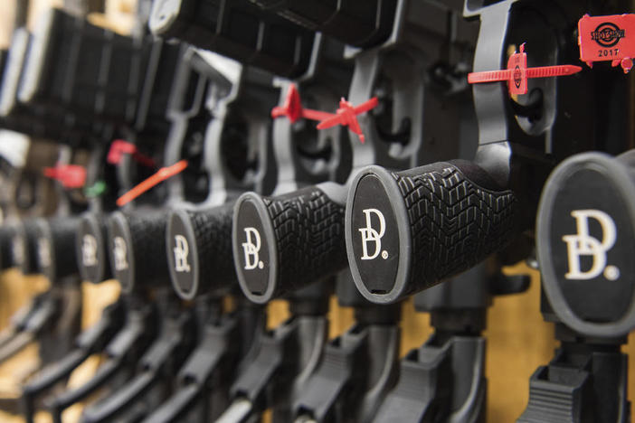 Daniel Defense guns shown with logo outfacing.