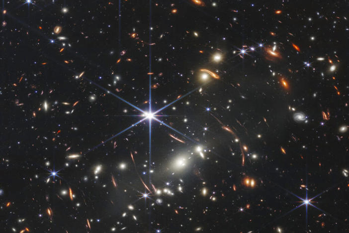 This image provided by NASA on Monday, July 11, 2022, shows galaxy cluster SMACS 0723, captured by the James Webb Space Telescope. The telescope is designed to peer back so far that scientists can get a glimpse of the dawn of the universe about 13.7 billion years ago and zoom in on closer cosmic objects, even our own solar system, with sharper focus.