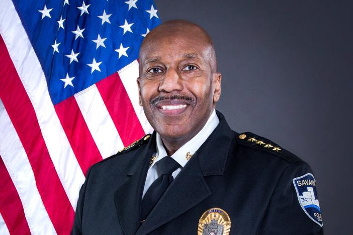 Portrait of Savannah Police Chief Roy Minter in uniform in front of an American flag