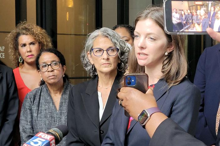  Attorney Julia Stone speaks with reporters outside the Lewis R. Slaton Courthouse in Atlanta. Stone was one of the attorneys who presented arguments Monday in a case that could put a hold on Georgia’s six-week abortion ban.