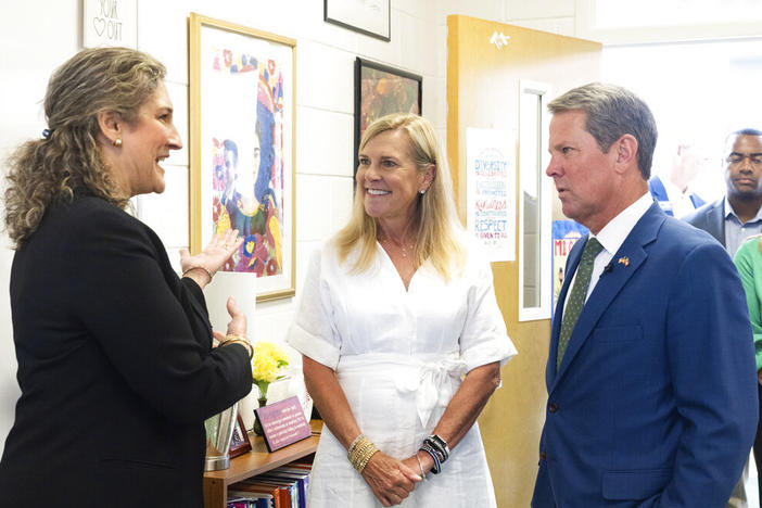 Georgia Gov. Brian Kemp and First Lady of Georgia Marty Kemp meet with Dorcas Acosta, a Spanish teacher at Ola High School, on Friday, July 29, 2022, in McDonough, Ga.