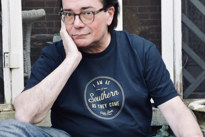 Chuck Reece in a blue t-shirt