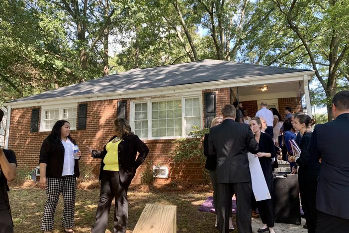  On Sept. 12, Atlanta city officials, nonprofit housing advocates and representatives with health care provider CareSource gathered on site of one of the homes that will provide more affordable rental housing through an Atlanta Neighborhood Development Partnership campaign. Stanley Dunlap/Georgia Recorder 