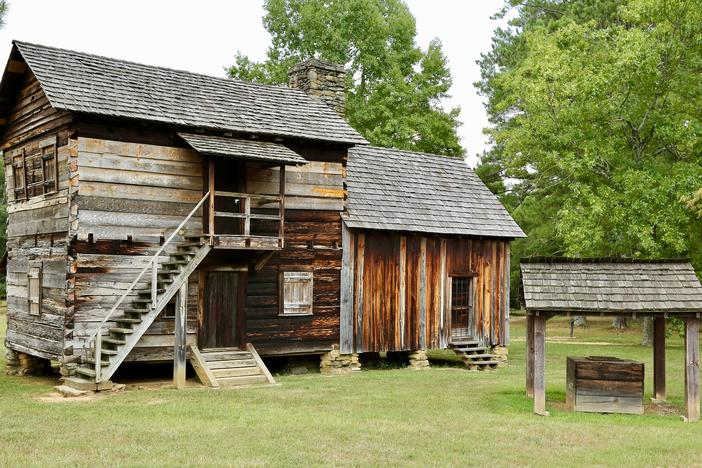 two-story wooden cabin