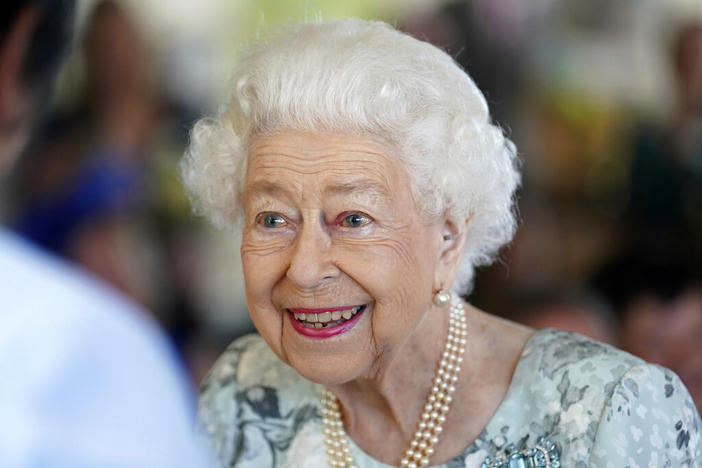 Britain's Queen Elizabeth II looks on during a visit to officially open the new building at Thames Hospice, Maidenhead, England July 15, 2022. Buckingham Palace says Queen Elizabeth II is under medical supervision as doctors are “concerned for Her Majesty’s health.” The announcement comes a day after the 96-year-old monarch canceled a meeting of her Privy Council and was told to rest.