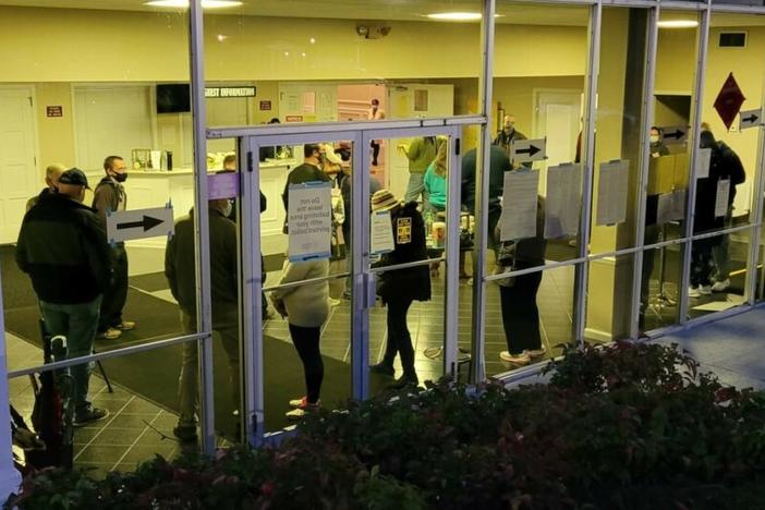 Cobb County voters queued up inside on a chilly morning during the 2020 election. 