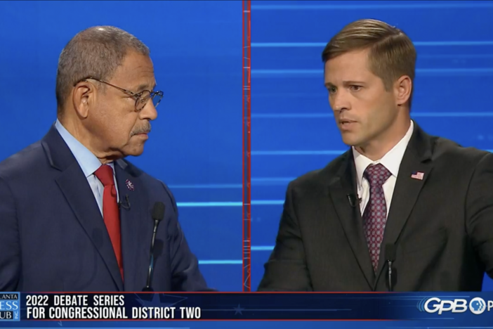 Rep. Sanford Bishop (left) and Republican Chris West face off in a debate Sunday, Oct. 16, 2022.