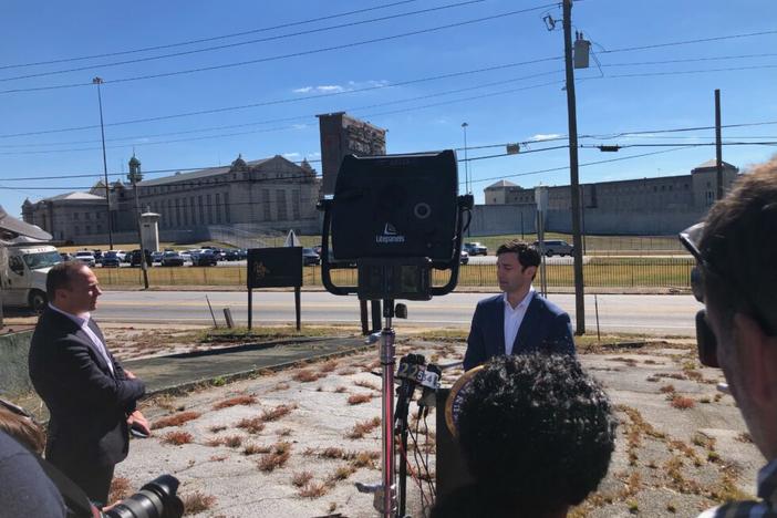 U.S. Sen. Jon Ossoff speaks with reporters after inspecting the federal penitentiary in Atlanta. (Photo credit: Dave Williams)