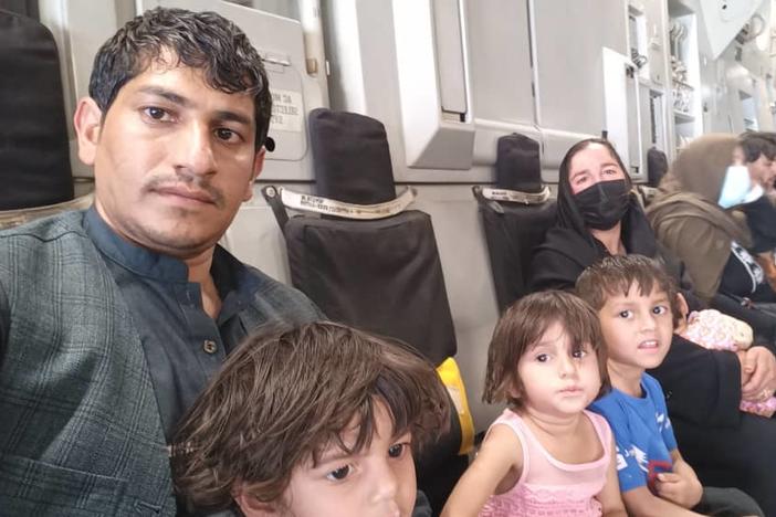 Zak and Family on Air Force plane out of Kabut