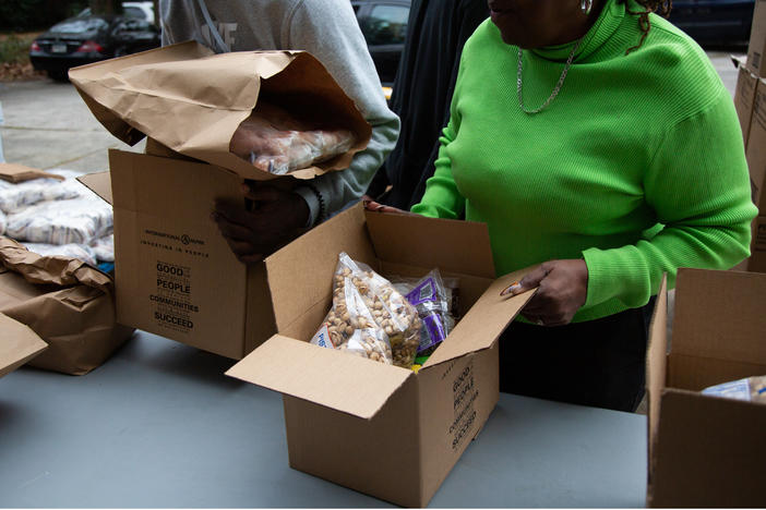 Jericho Road Ministry in Macon, Ga., hosts a Thanksgiving food drive on Nov. 22, 2022 with food donated from the Middle Georgia Community Food Bank. About 96,000 people are considered food insecure in food bank's 24-county region.