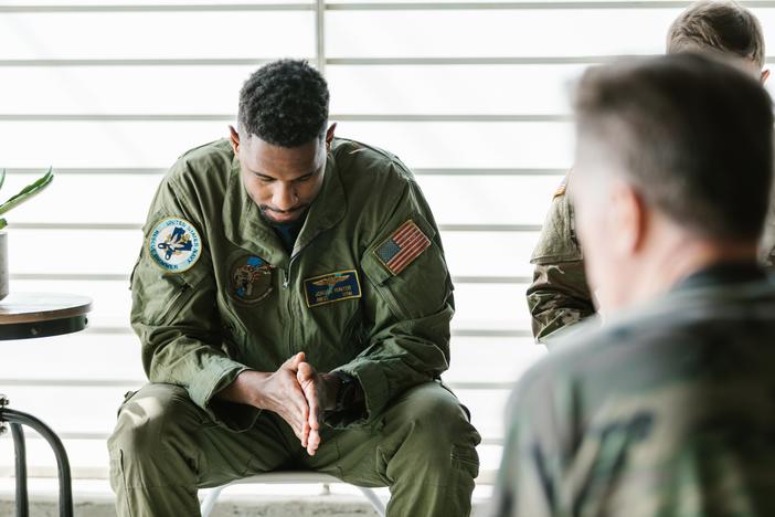 Photo of soldier looking down