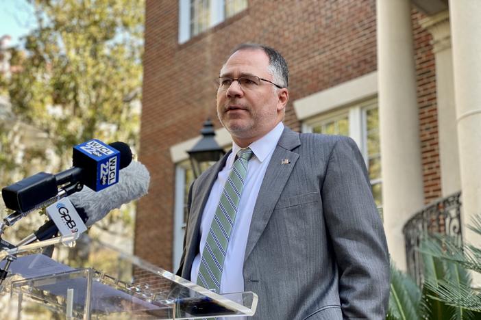 U.S. Attorney for the Southern District of Georgia David Estes speaks outside the United Way of the Coastal Empire in downtown Savannah on Dec. 8, 2022, about federal funding for Tharros Place.
