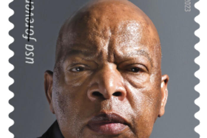This image provided by the U.S. Postal Service on Tuesday, Dec. 13, 2022, shows a new postage stamp honoring the late congressman and civil rights giant John Lewis. (U.S. Postal Service via AP)