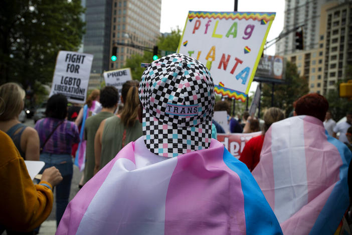 Supporters of Georgia's transgender and non-binary community stroll through the city's Midtown district during Gay Pride Festival's Transgender Rights March in Atlanta on Saturday, Oct. 12, 2019.