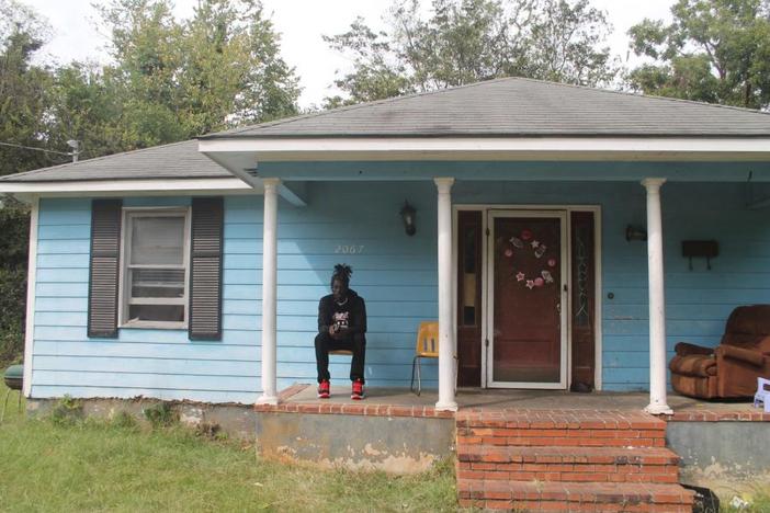 Stacy Jones lives in a small blue house at the dead end of Roosevelt Avenue with his 6-year-old daughter and 97-year-old grandmother. He said he feels like Pleasant Hill is being gentrified. 