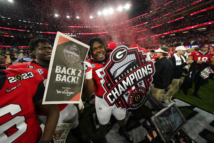 Georgia players celebrate a win over TCU after the national championship NCAA College Football Playoff game, Monday, Jan. 9, 2023, in Inglewood, Calif. Georgia won 65-7. (AP Photo/Ashley Landis)