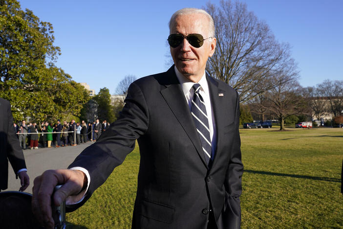 President Joe Biden talks with reporters on the South Lawn of the White House in Washington, Monday, Jan. 30, 2023, after returning from an event in Baltimore on infrastructure.