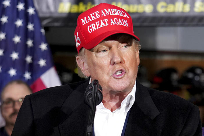 Former President Donald Trump speaks at the East Palestine Fire Department as he visits the area in the aftermath of the Norfolk Southern train derailment Feb. 3 in East Palestine, Ohio, Feb. 22, 2023. Trump’s lawyers in Georgia are criticizing the Fulton County investigation into potential illegal election meddling after the foreperson of the special grand jury seated to help the probe went public this week.