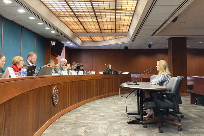 Georgia Human Services Commissioner Candice Broce, right, testifies in favor of a bill that would slow the flow of children into foster care on Thursday, Feb. 16, 2023, at the Capitol in Atlanta. Lawmakers say they plan to rewrite the bill after others raised concerns. 