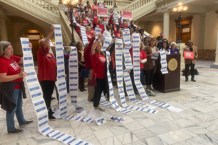 On Day 17 of teh 2023 legislative session, Georgia lawmakers speak as advocates display names of people affected by gun violence  in the state.