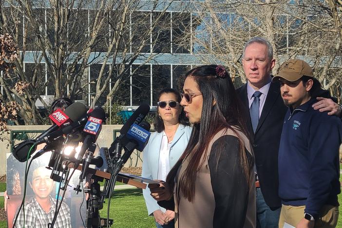  Manuel Teran’s mother speaks at a Feb 6, 2023 press conference surrounded by family including Teran’s father and brother.