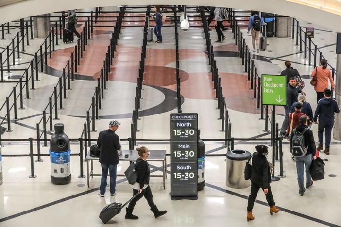 The security lines were thin at 6:34 A.M. at Hartsfield-Jackson International Airport Friday, March 13, 2020. JOHN SPINK/JSPINK@AJC.COM
