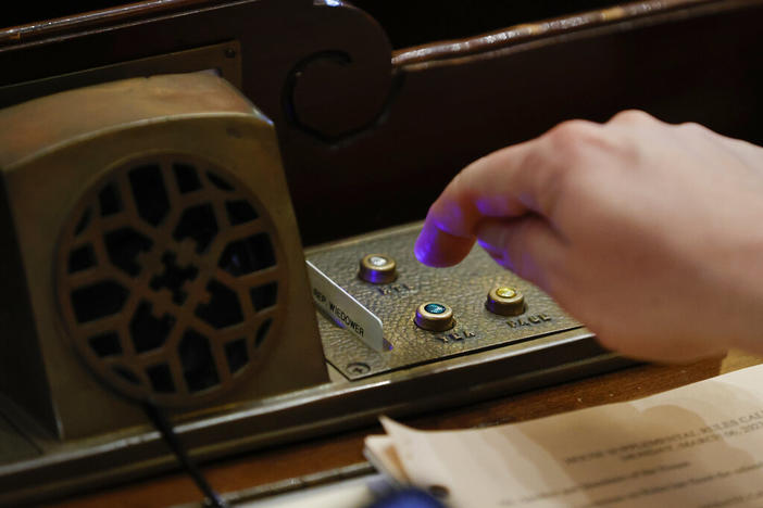 Rep. Marcus Wiedower, R-Watkinsville, votes yea for HB 493 in the House chambers during crossover day at the Georgia State Capitol on Monday, March 6, 2023, in Atlanta. 