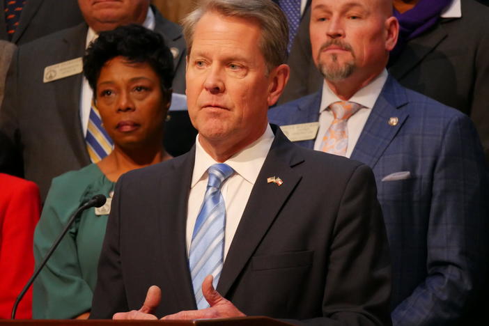  Gov. Brian Kemp speaks to reporters after signing the amended fiscal year 2023 budget in early March. Jill Nolin/Georgia Recorder