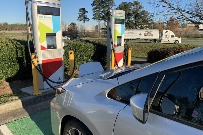  An electric vehicle charges up at a Georgia Power station located in the parking lot of a Burger King in Columbus. Jill Nolin/Georgia Recorder