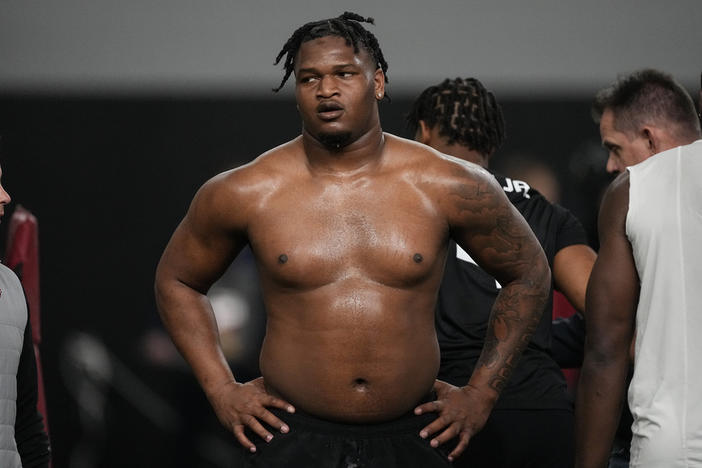 Former Georgia defensive lineman Jalen Carter stands after running football drills during Georgia's Pro Day, Wednesday, March 15, 2023, in Athens, Ga.