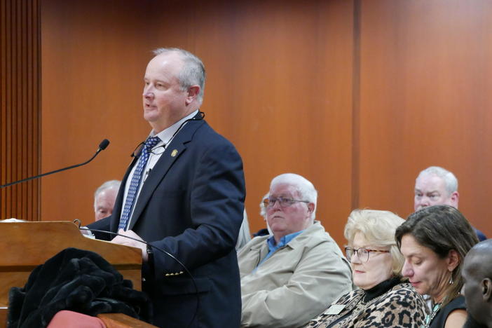  Rep. John Corbett, a Lake Park Republican, speaks against a bill that would ban future mining applications at Trail Ridge near the Okefenokee Swamp as the bill sponsor, Rep. Darlene Taylor, sits to his left. Jill Nolin/Georgia Recorder