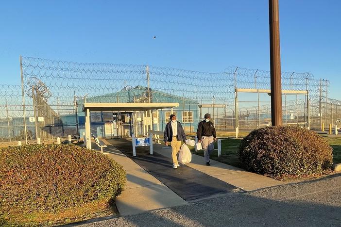 Man walking out of prison.