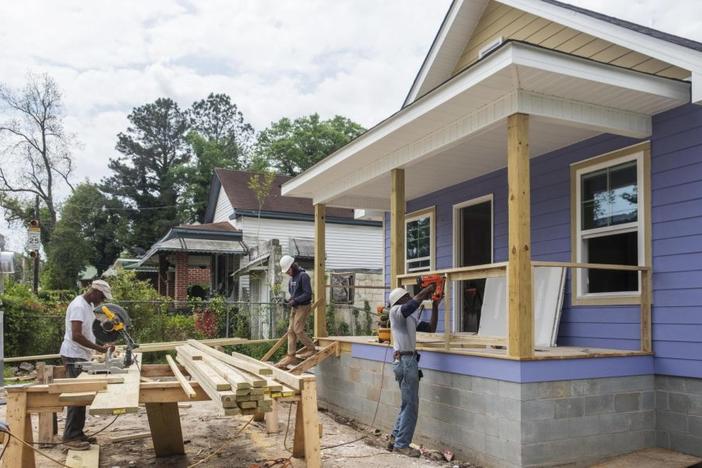 A crew employed by Stafford Construction works on a new home on Ward Street in Macon’s Pleasant Hill neighborhood. Pleasant Hill is one of the places carved out for work by a new, federally funded affordable housing non-profit group of which Stafford Construction is a member.