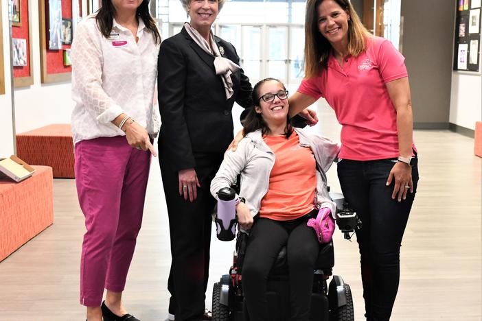 Allea Christopher (center) with LeAnne McCall (center left) and Claire Walton (right)