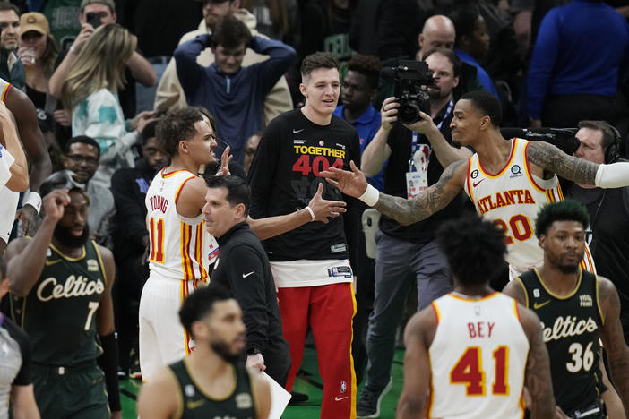 Atlanta Hawks guard Trae Young (11) is congratulated after the team's win over the Boston Celtics in Game 5 in a first-round NBA basketball playoff series Tuesday, April 25, 2023, in Boston. 