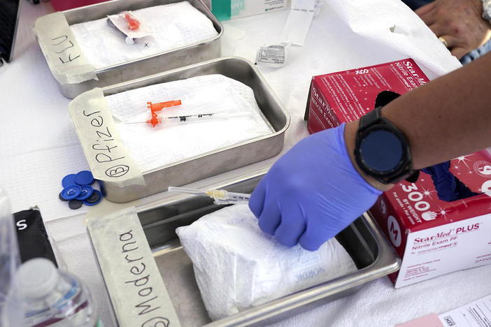 Vaccines sit at the ready at the L.A. Care and Blue Shield of California Promise Health Plans' Community Resource Center where they were offering members and the public free flu and COVID-19 vaccines Friday, Oct. 28, 2022, in Lynwood, California.