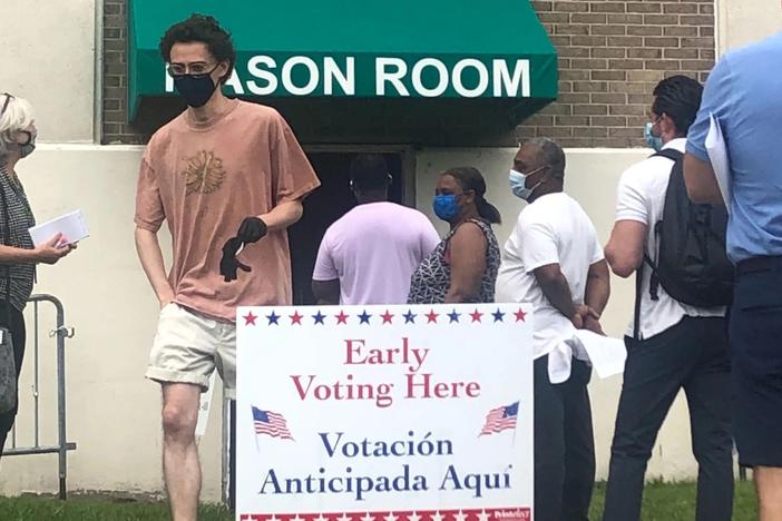 Voters wait in line at the Savannah Civic Center on the first day of early voting for the November 2020 General Election. Credit: Margaret Coker/The Current