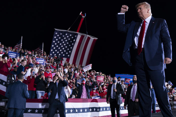 President Donald Trump walks off stage after speaking during a campaign rally at Middle Georgia Regional Airport, Friday, Oct. 16, 2020, in Macon, Ga.