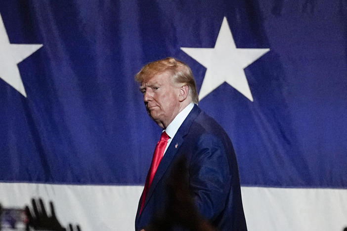 Former President Donald Trump exits the stage after speaking at the Georgia Republican convention on Saturday, in Columbus, Ga., his first public appearance responding to the unsealing of his federal indictment. / AP  Updated June 1